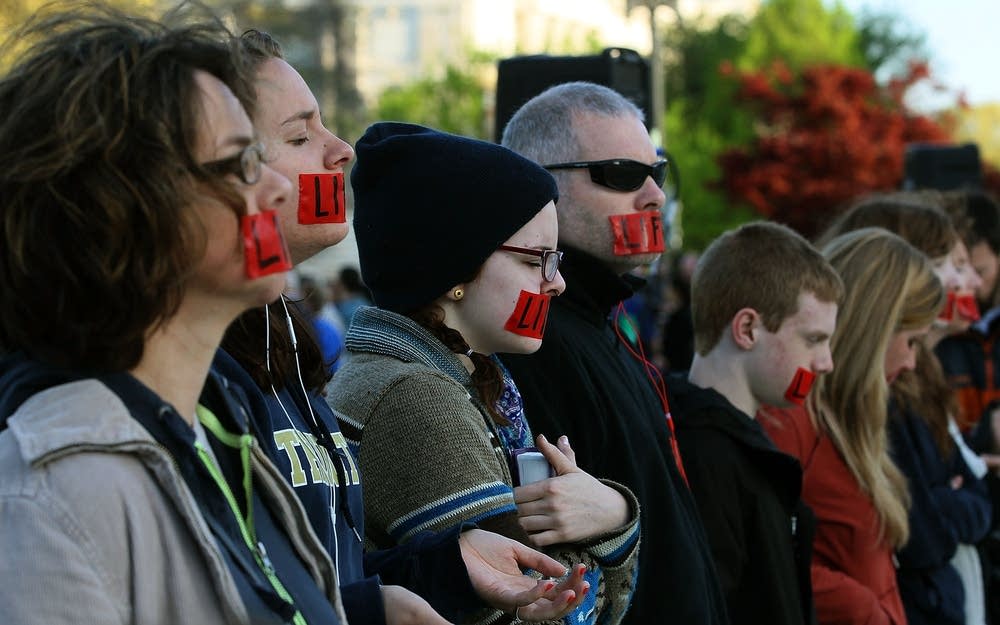 People pray in front of the U.S. Supreme Court