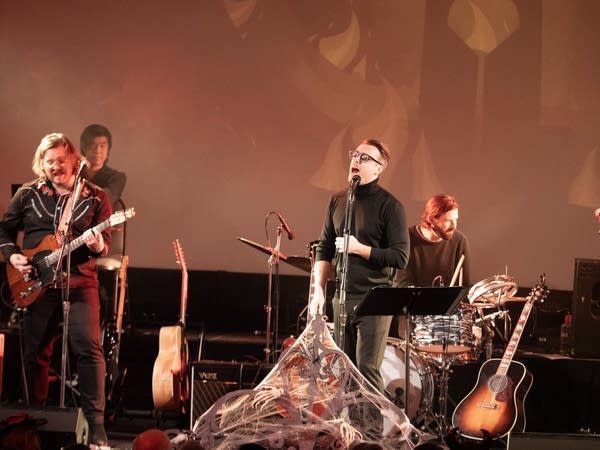 A band performing onstage