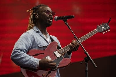 Eric Burton performs at Farm Aid 40.