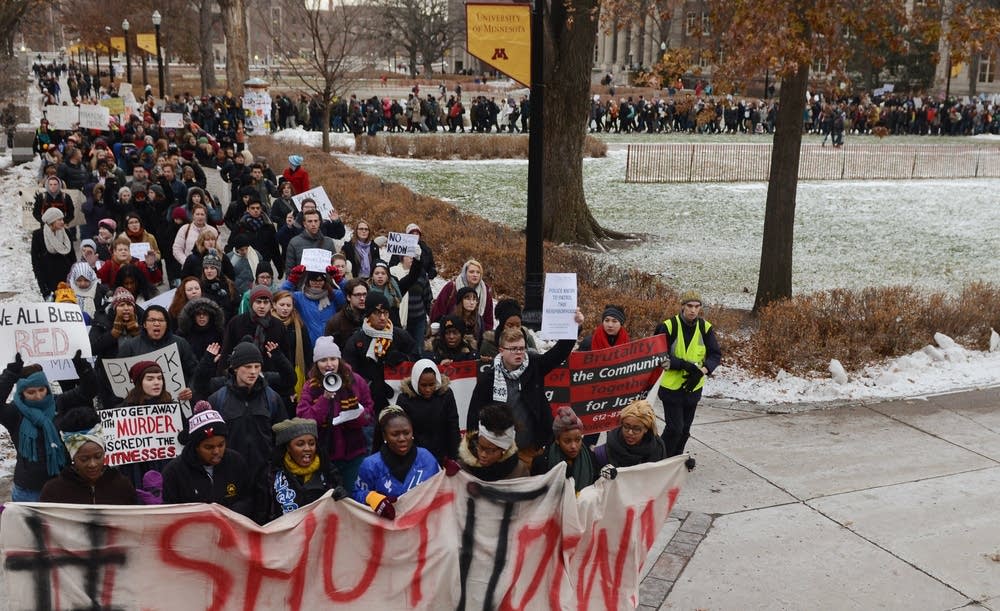 Protesters march through Northrop Mall