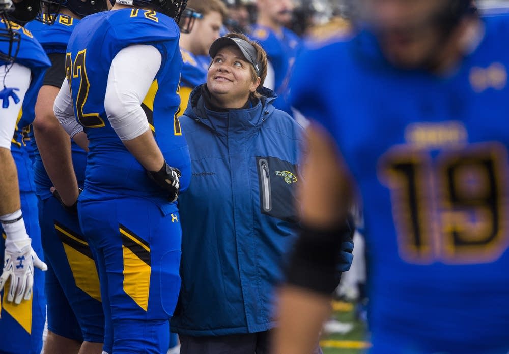 Sister Maurer walks the sidelines.