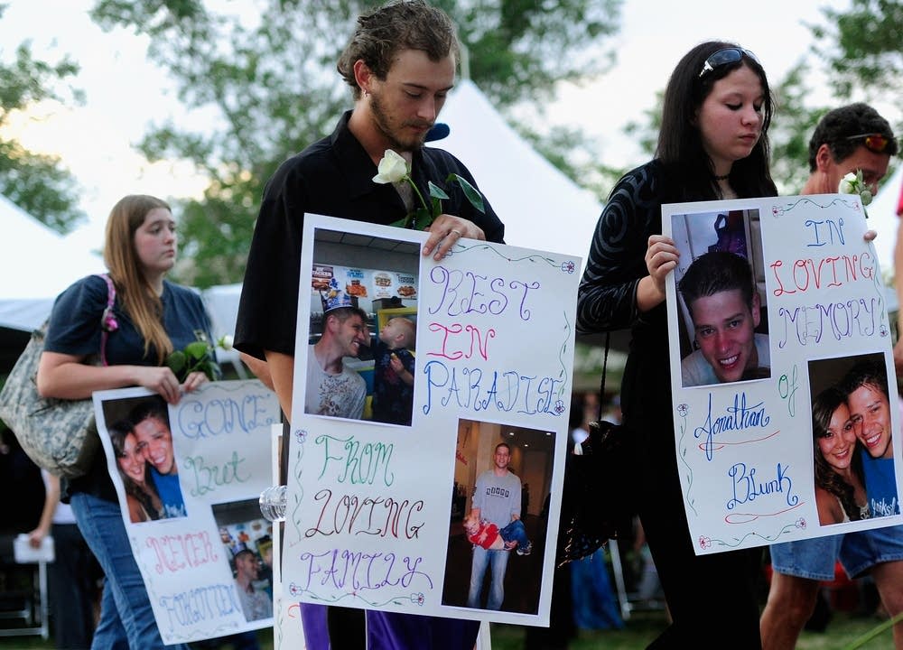 Family members of the 12 victims