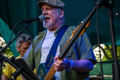 a band performing on an outdoor stage