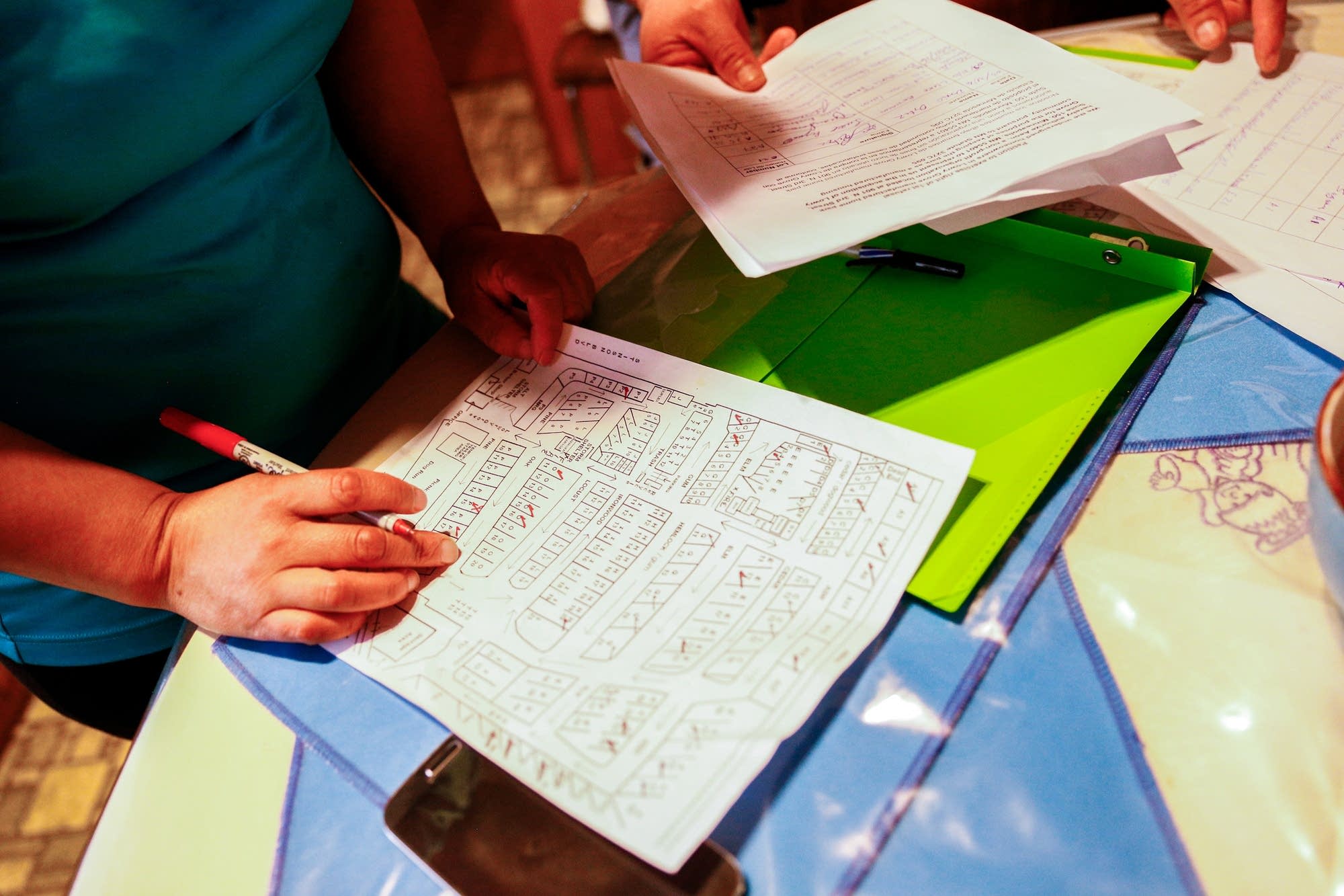 Antonia Alvarez checks a map of the park.