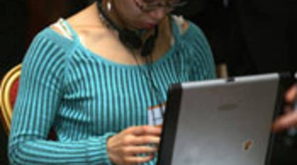 Woman surfs the Internet