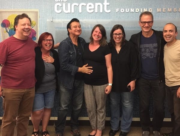Steve Perry bestows his blessing upon Andrea Swensson's expected child; present at the ceremony are (L to R) MPR recording engineer Cameron Wiley; The Current's Jill Riley; Perry; Swensson; Jill Weindorf of Concord Records; The Current's program director Jim McGuinn and music director David Safar.