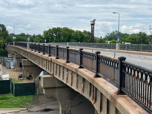 A bridge shows a dent in the structure.