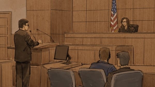 A courtroom sketch of a court hearing.
